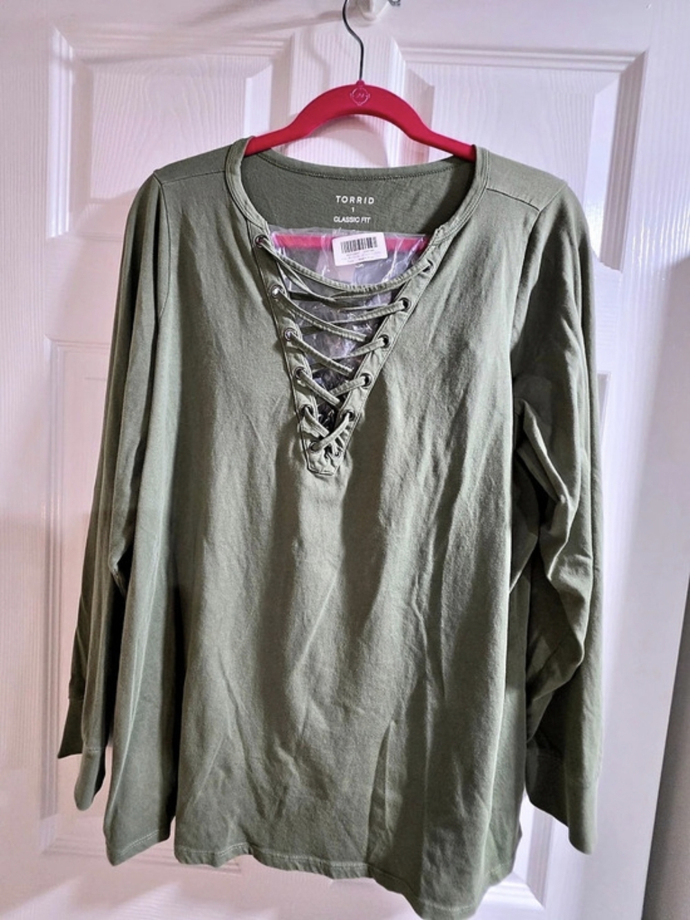 New in package-Torrid- Size 1- Olive Green Lace-Up Front Long Sleeve Top